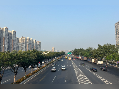 走访残特奥会广州限行区早高峰路况：汇入主干道的车流通畅