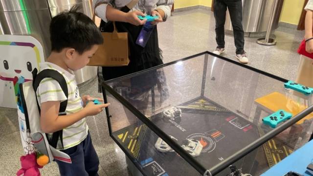 少年儿童在广州体验“科技市集”，哪项科技最受欢迎？