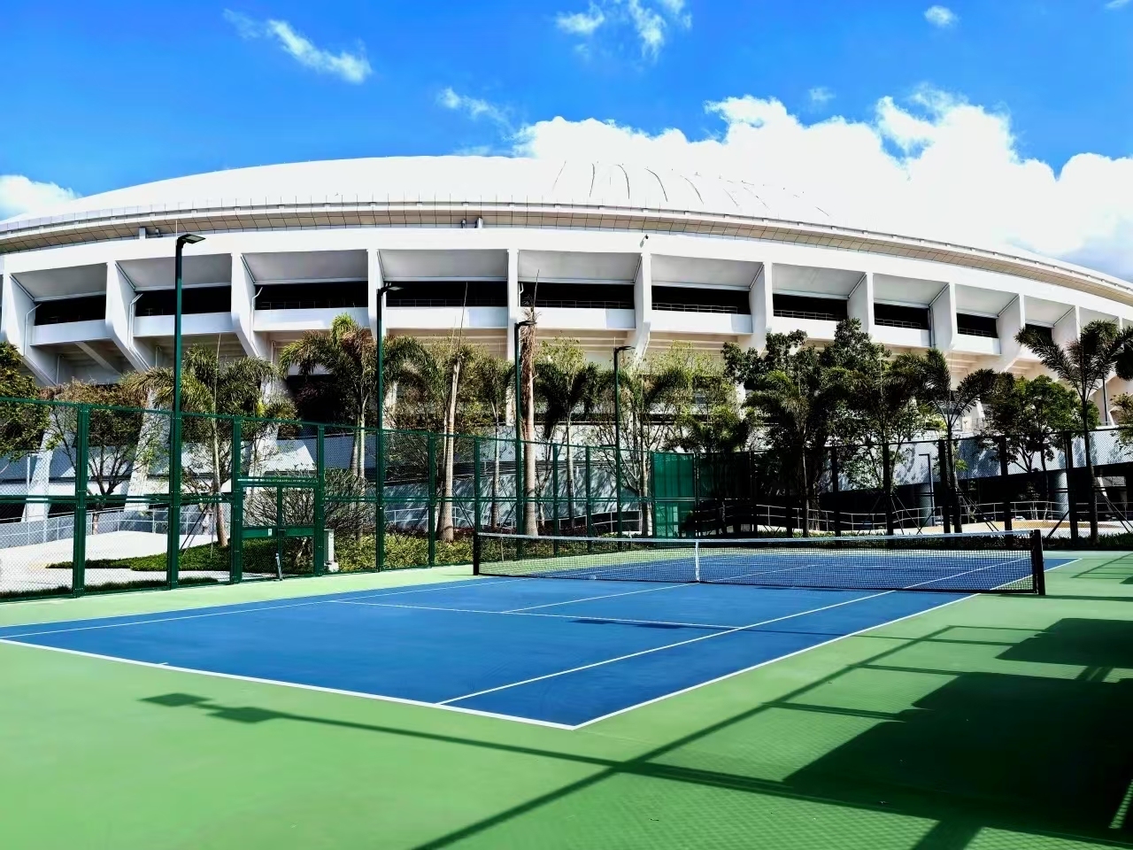 Blue tennis courts at Shenzhen Sports Center