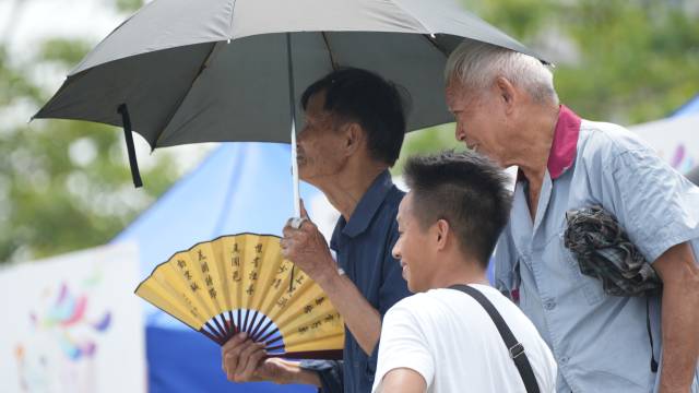 仙湖畔,海内外众多观众到场观战助威。 南方+ 萧皓隆 拍摄