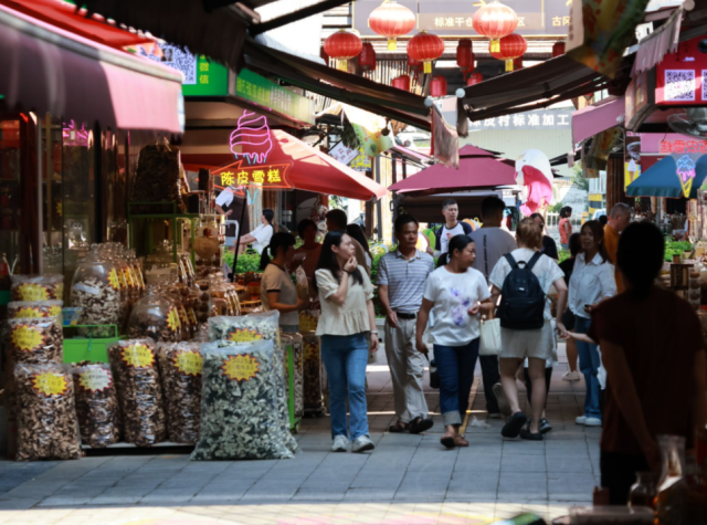 陈皮领衔风味盛宴，非遗传承侨乡文脉，新会陈皮双节集市热力正酣