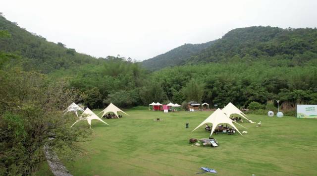 罗浮山下的绿地成为人们露营好去处