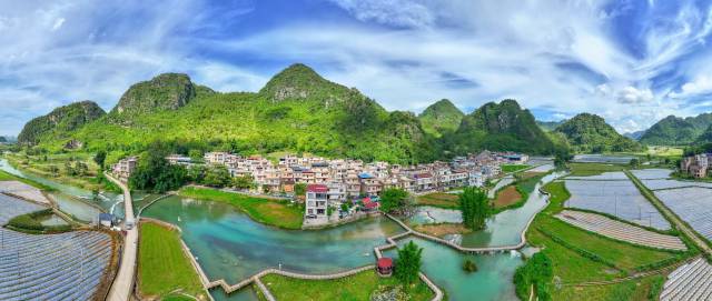 宜居宜业和美新建村全貌（航拍图）。周加孔/摄