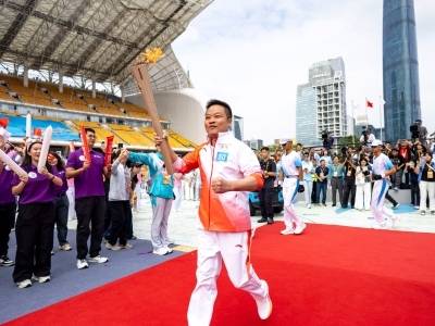 十五运会广州站最后一棒火炬手何小鹏：这是可以“吹很久的牛”｜我是火炬手