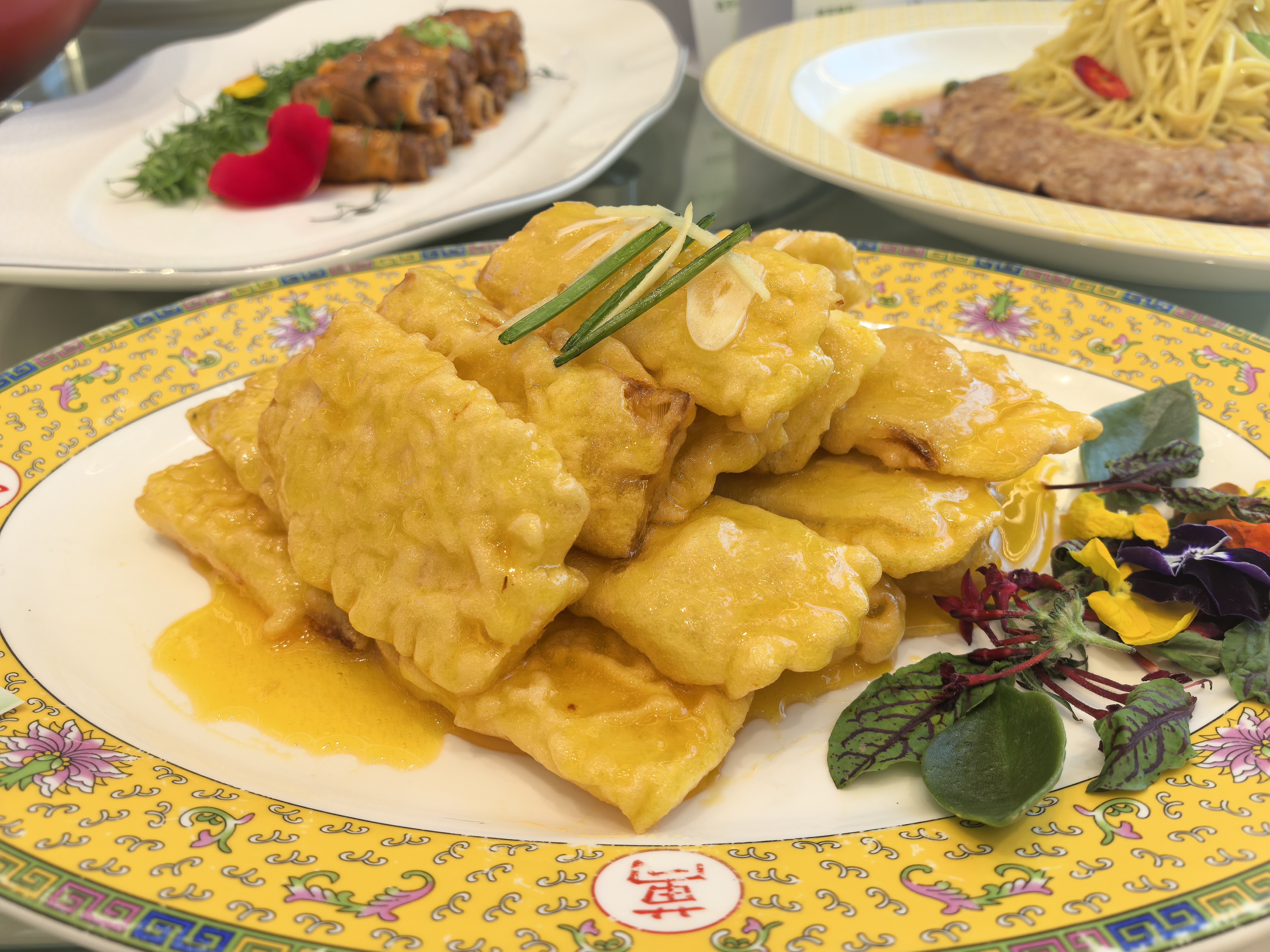 59名黑龙江名厨用西牛麻竹笋与黑土优品碰撞新型融合东北菜。图为用西牛麻竹笋做的东北“锅包笋”。 59名黑龙江名厨用西牛麻竹笋与黑土优品碰撞新型融合东北菜。图为用西牛麻竹笋做的东北“锅包笋”。