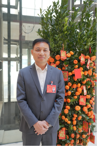 梁榕贵代表现场推荐广东年桔闯世界。谭家富摄