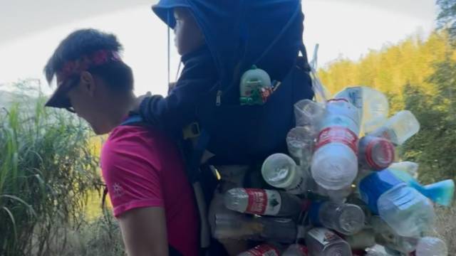 广州奶爸背娃爬山捡垃圾半年：清理超两百斤，希望别再乱扔了