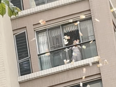 汕头通报“女子往窗外撒钱”：因亲属病重情绪波动